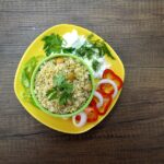 Piatto di riso e lenticchie ben presentato, ideale per una dieta equilibrata e saziante.